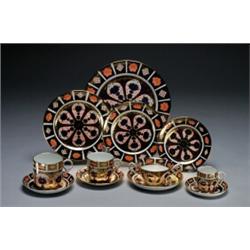 ROYAL CROWN DERBY '1128' PATTERN SERVICE, the panelled design painted in iron red, green, undergl...