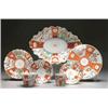 Image 1 : WORCESTER SCARLET JAPAN PATTERN CUP AND SAUCER, painted with orange-ground gilt lattice and diape...
