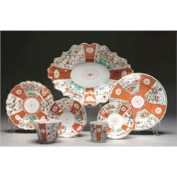 WORCESTER SCARLET JAPAN PATTERN COFFEE CUP AND SAUCER, painted with orange-ground gilt lattice an...