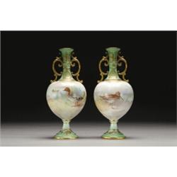 PAIR OF ROYAL DOULTON TWO-HANDLED VASES, each with a moulded and gilt printed green ground collar...