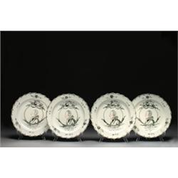 FOUR DUTCH-DECORATED ENGLISH CREAMWARE ORANGIST PLATES, with moulded scroll rims, each painted in...