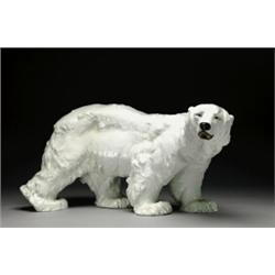 MEISSEN STRIDING POLAR BEAR, modelled by Otto Jarl, painted in white and detailed in colours, l....