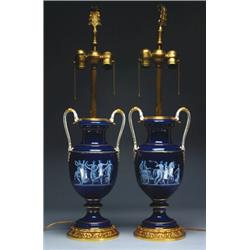 PAIR OF MEISSEN BLUE-GROUND TWO-HANDLED VASES, as table lamps, each body finely painted in white...