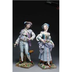 PAIR OF WALLENDORF FIGURES, modelled as a young man or young woman collecting flowers painted in...