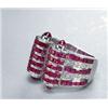 Image 1 : 18K WHITE GOLD OPEN BAND, formed as a scroll channel set with 90 square cut rubies (approx. 6.00c...