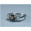 Image 1 : PLATINUM RING, set with an oval cut alexandrite (approx. 1.68ct.) flanked by 2 brilliant cut diam...