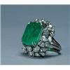 Image 1 : 14K WHITE GOLD COCKTAIL RING, set with an emerald cut emerald (approx. 18.75ct.) within a frame o...