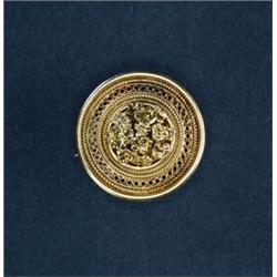 ITALIAN 18K YELLOW GOLD BROOCH, with pierced and twisted gold wire decoration and a central flora...