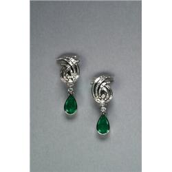 PAIR OF 18K WHITE GOLD STUD BACK DROP EARRINGS, each formed as a spray set with a brilliant cut a...