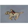Image 1 : 18K YELLOW GOLD BROOCH, realistically formed as a horse and jockey, encrusted with approximately...