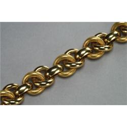 ITALIAN 18K YELLOW GOLD BRACELET, formed of oval and curbed links, some with frosted decoration,...