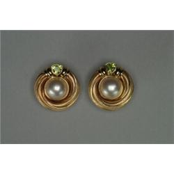 PAIR OF 14K YELLOW GOLD OMEGA CLIP AND STUD BACK EARRINGS, each formed as a swirled border around...