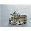 Image 1 : 18K YELLOW GOLD RING, formed as a serpent and set with 49 brilliant cut diamonds (approx. 0.62ct....