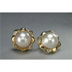 PAIR OF 14K YELLOW GOLD STUD BACK EARRINGS, each bezel set with a maubT pearl and decorated with...