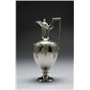 Image 1 : VICTORIAN SILVER CLARET JUG, the ovoid body chased, engraved and embossed with scrolling foliage,...