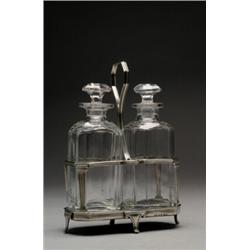 GEORGE III SILVER CRUET STAND, of rectangular form with canted corners fitted with two cut glass...