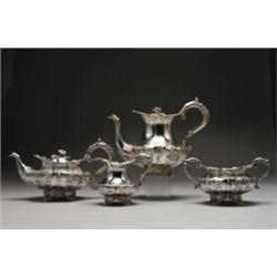 WILLIAM IV SILVER TEA AND COFFEE SERVICE, of lobed form, repoussT and chased with scrolling acant...