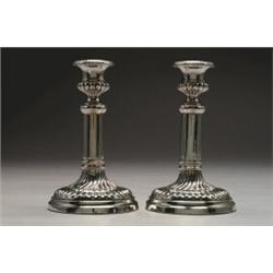 PAIR OF GEORGE III SILVER CANDLESTICKS, each with campana socket and removable nozzle on a plain...