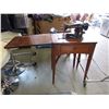 Image 1 : Vintage Singer sewing machine in cabinet