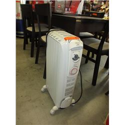 Electric radiator style heater - used
