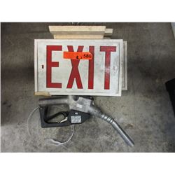 2 Exit signs & a gas pump handle