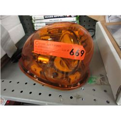 Amber spinning roof light for an automobile