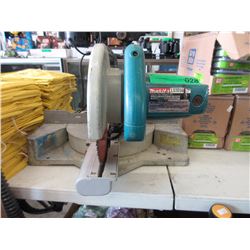 Electric Makita slide compound saw - used