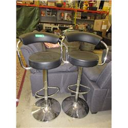 Pair of used hydraulic bar stools