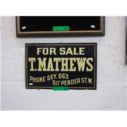 Vintage metal sign "T. Matthews"