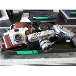 3 Vintage 35mm cameras
