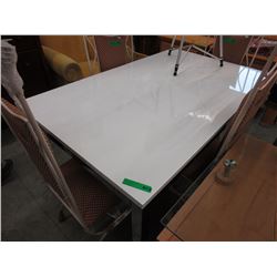 Dining table with chromed legs