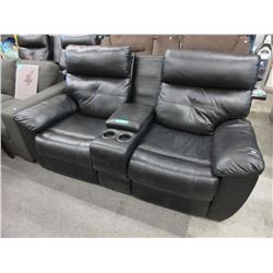 Power reclining loveseat with theater console