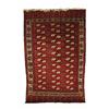 Image 1 : A YOMUD MAIN CARPET, West Turkestan, late 19th Century, the claret field containing 36 guls in bl...