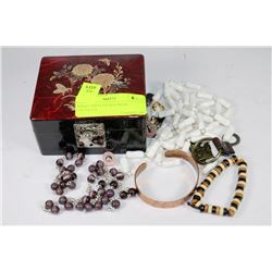 SMALL SHELLED BOX WITH CONTENTS