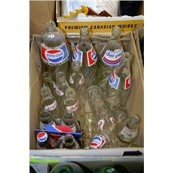 BOX OF ASSORTED VINTAGE PEPSI BOTTLES
