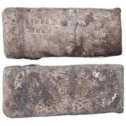 Small, thick, brick-like "tumbaga" silver bar #1128, 2395 grams, marked with assayer/owner B~Vo, ser