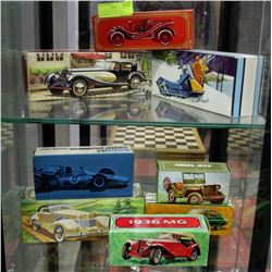 ESTATE COLLECTION OF 8 AUTOMOBILE & SNOWMOBILE