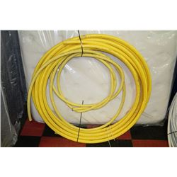 BUNDLE OF COILS OF YELLOW GAS LINE