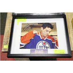 JUSTIN SCHULTZ FRAMED & AUTOGRAPHED ROOKIE PHOTO