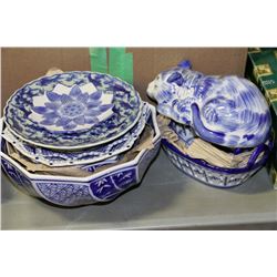 STACK OF BLUE AND WHITE CERAMIC DISHES AND