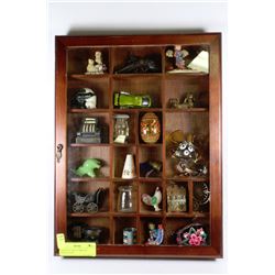 GROUP OF COLLECTIBLES IN DISPLAY CASE
