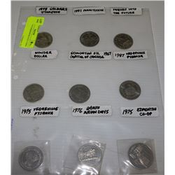 PAGE OF 9 COMMEMORATIVE COINS