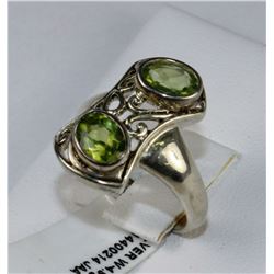 #0093 - STERLING SILVER PERIDOT RING - 4.9 GRAMS