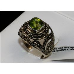 #0047 - STERLING SILVER PERIDOT RING - 4.4 GRAMS