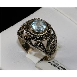 #0052 - STERLING SILVER PERIDOT RING - 4.8 GRAMS