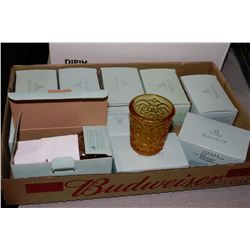BOX OF PARTYLITE VOTIVE CANDLES WITH SOME HOLDERS