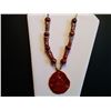 Image 1 : HANDCRAFTED CERAMIC NECKLACE ON SILK CORD