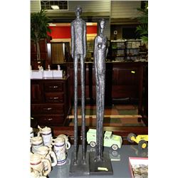 HUSBAND & WIFE STATUES W/EXTRA LONG LEGS