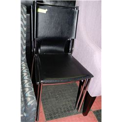 2 BLACK HARD LEATHER STACKING CHAIRS