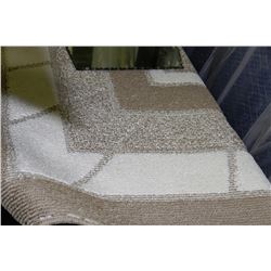 WHITE AND BEIGE 4 X 6 AREA CARPET